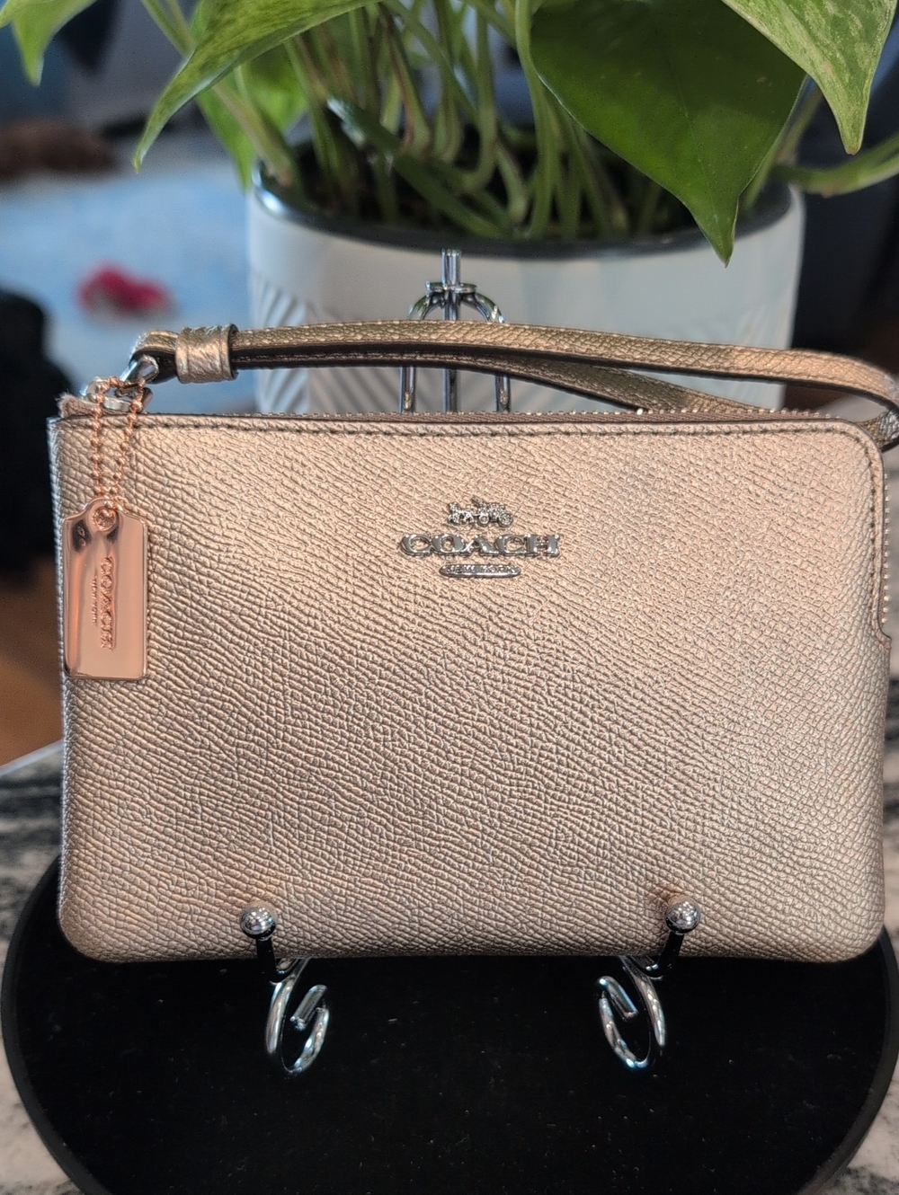 COACH Metallic Rose Gold Pebbled Leather Wristlet